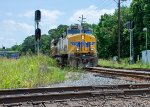 A westbound intermodal approaches the CPKC Diamonds